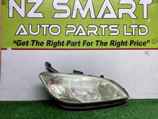 2004 Honda Civic - Right Headlight PN: STANLEY 8519806800