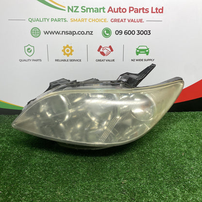 2004 Mazda MPV - Left Headlight PN: STANLEY P3811
