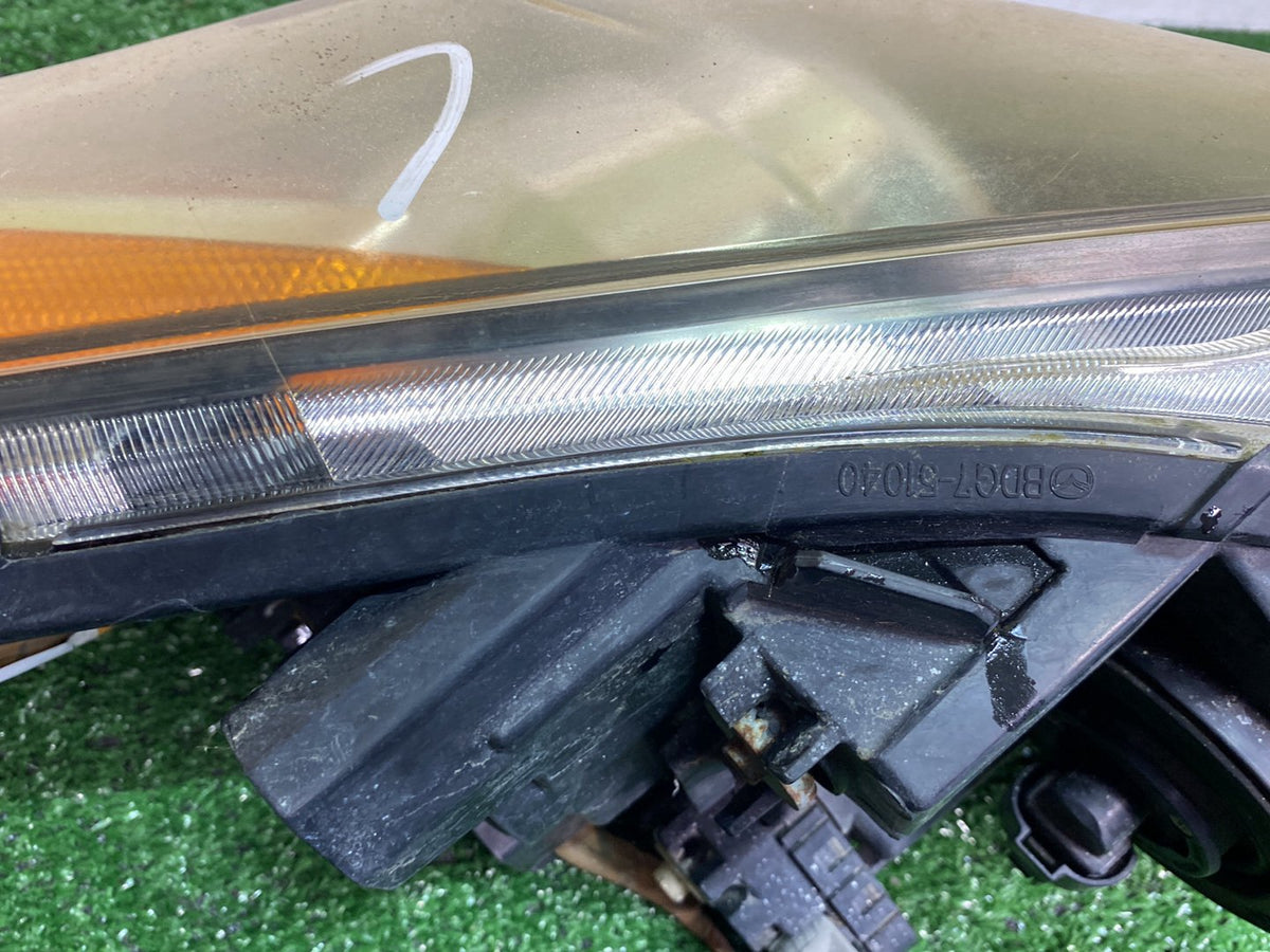 2009 Mazda Axela - Left Headlight Auto adjust/ Non Hid/ Koito 100-41343