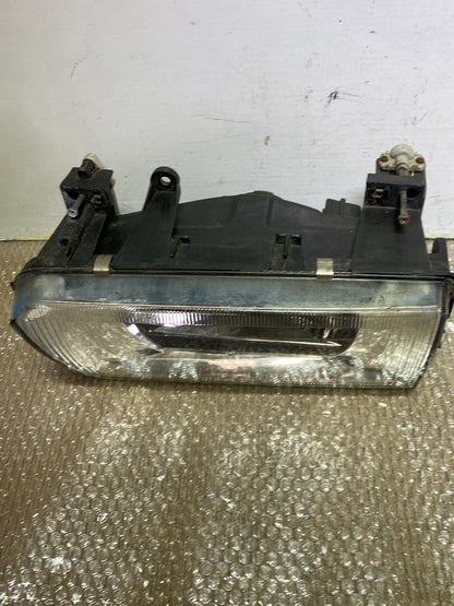 2003 Mitsubishi L300- Right Headlight PN: see photos