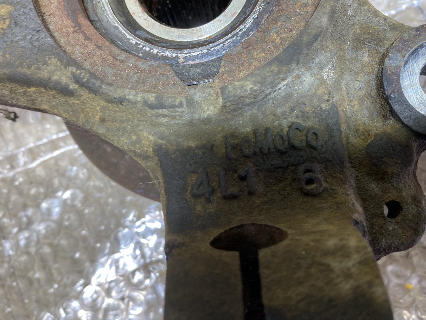 2006 Mazda Axela- Left Front Steering Knuckle PN: see photos