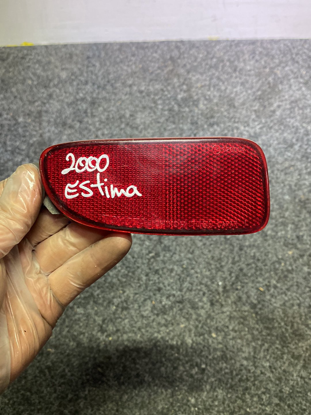 2000 Toyota Estima - Left Rear Bumper Reflector PN: ICHIKOH 7480