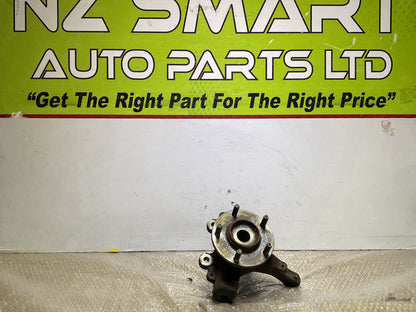 2006 Mazda Axela- Left Front Steering Knuckle PN: see photos
