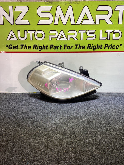 Nissan Tiida - Right Headlight PN: Stanley 2167482600