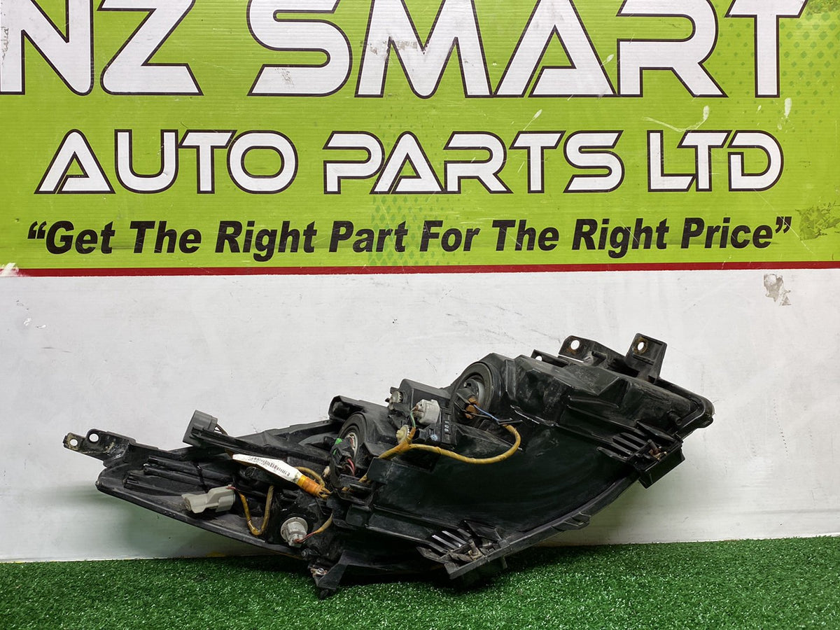 2009 Mazda Axela - Left Headlight Auto adjust/ Non Hid/ Koito 100-41343