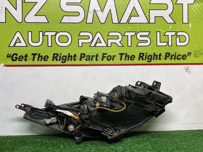 2009 Mazda Axela - Left Headlight Auto adjust/ Non Hid/ Koito 100-41343
