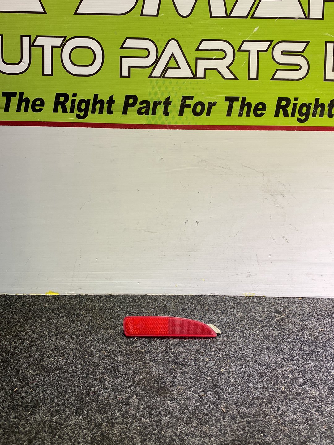 2006 Mazda Axela - Left Rear Bumper Reflector PN: STANLEY P2491 B