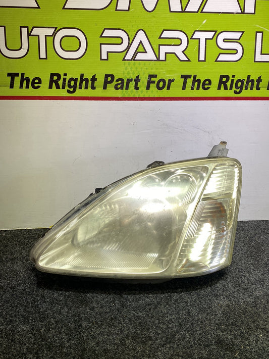 2003 Honda Civic - Left Headlight PN: STANLEY P1528