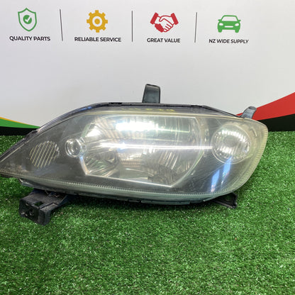 2002 Mazda Demio - Left Headlight PN: STANLEY P1919