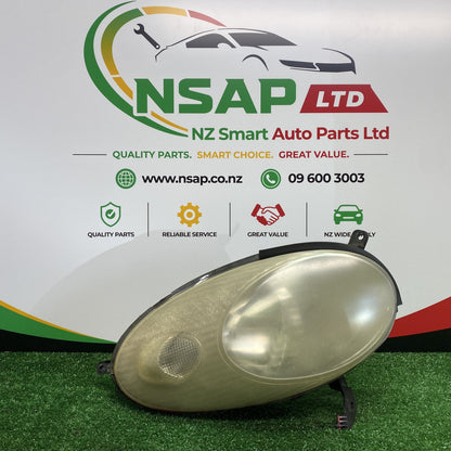 2004 Nissan March - Right Headlight PN: ICHIKOH 1704