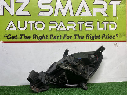 2007 Mazda Verisa - Right Headlight PN: D673510K0