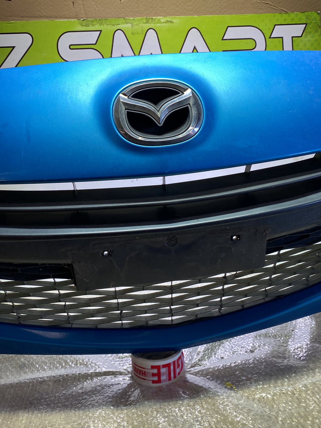 2009 Mazda Axela- Front Bumper PN: see photos