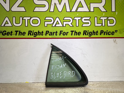 2004 Nissan Bluebird- Left Rear Quarter Door Glass PN: M2E2