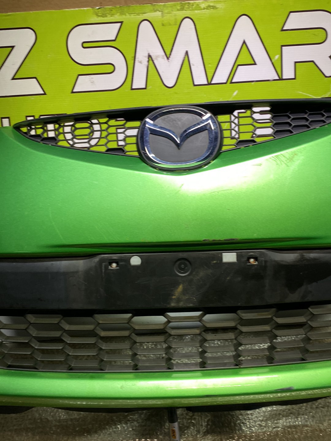 2010 Mazda Demio- Front Bumper PN: see photos