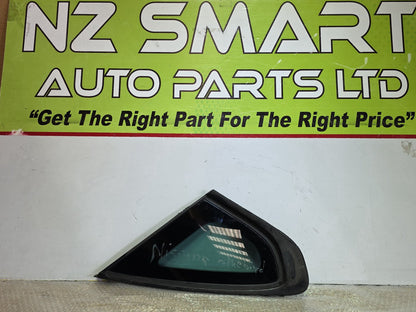 2006 Nissan Bluebird- Left Rear Quarter Door Glass PN: M282