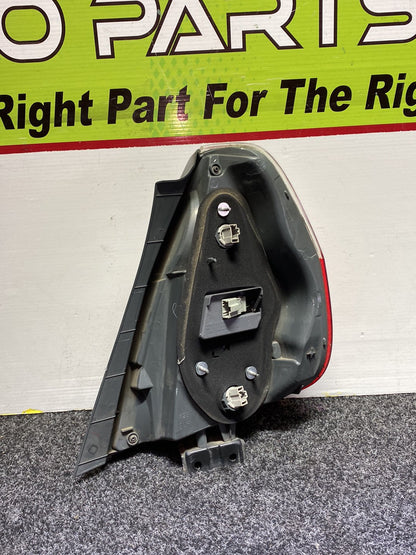 2005 Honda Fit - Left Taillight PN: ICHIKOH 4995